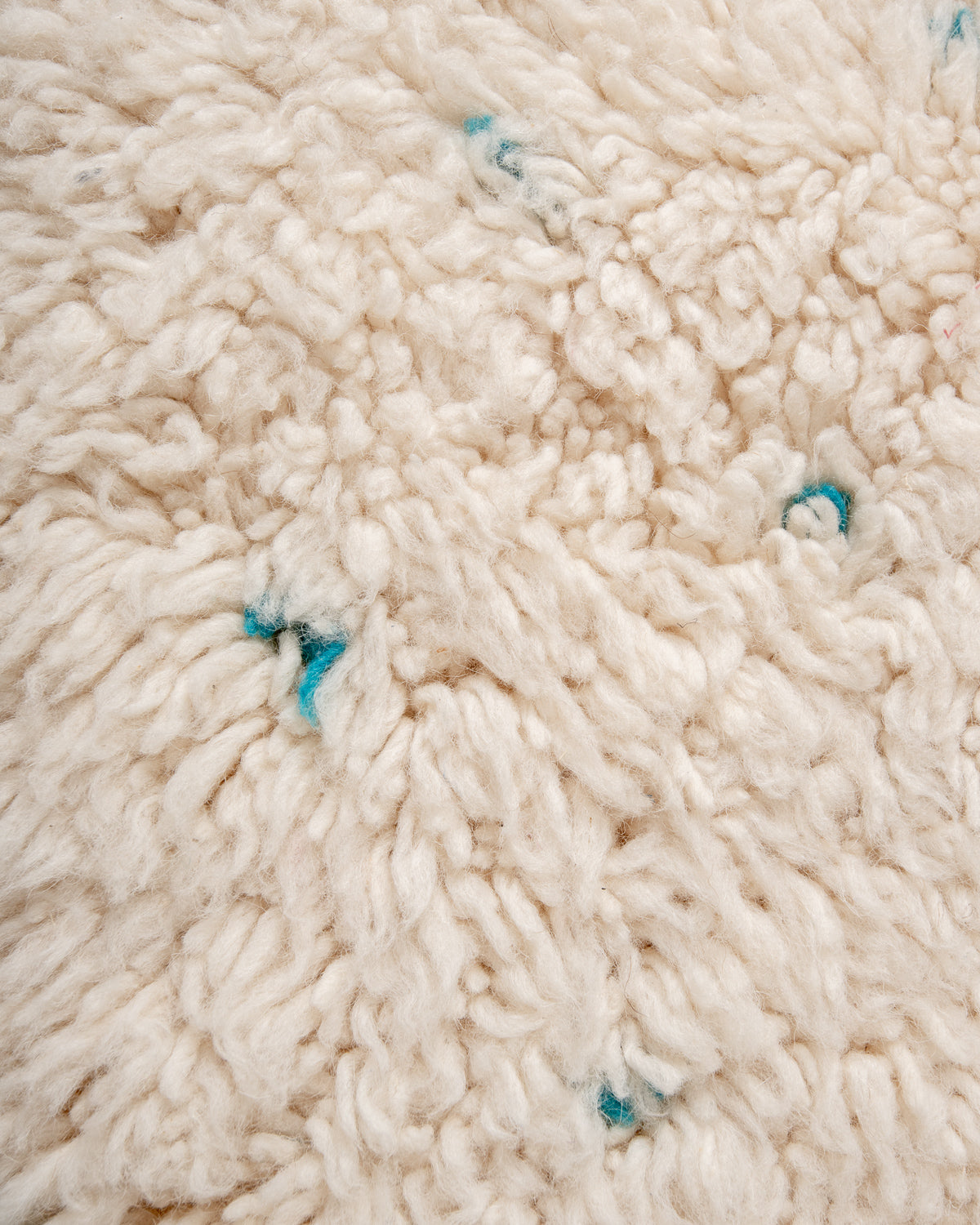 Modern, designer, handcrafted Berber rug from Morocco. Beniourain carpet with beautiful colours and patterns and fluffy wool texture.